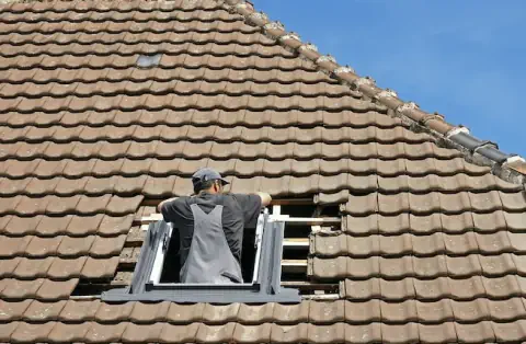 Pose de velux - La Rivière